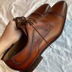 Men’s brown dress shoes.